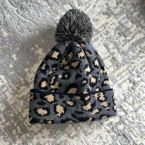 Amazon Gray and Black Knitted Winter Hat with Pom-Pom